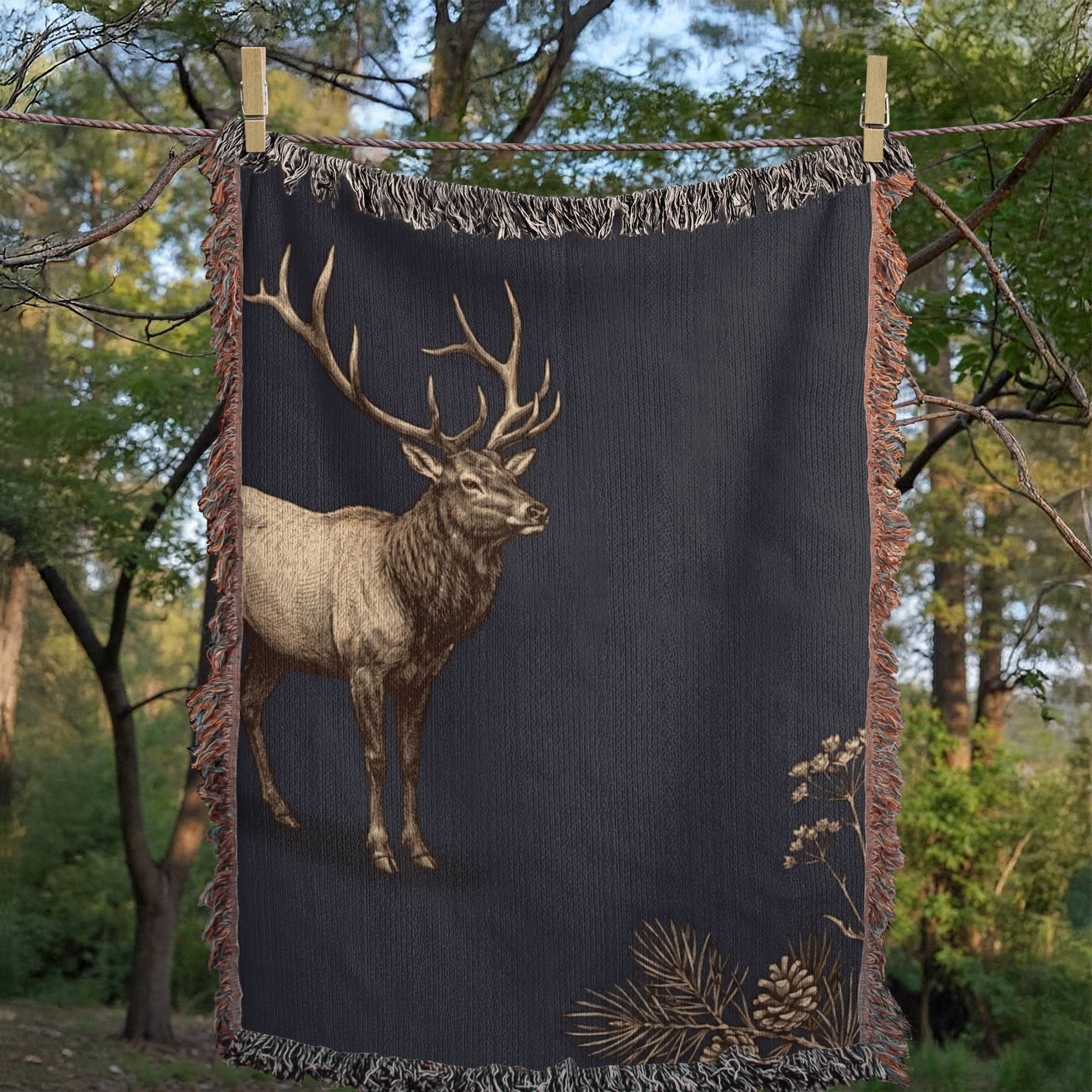 Timberline Ridge elk woven tapestry throw blanket product detail shot — Trini Skies