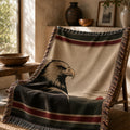 The Sentinel bald eagle woven throw blanket draped over a chair in a mountain lodge living room — Trini Skies