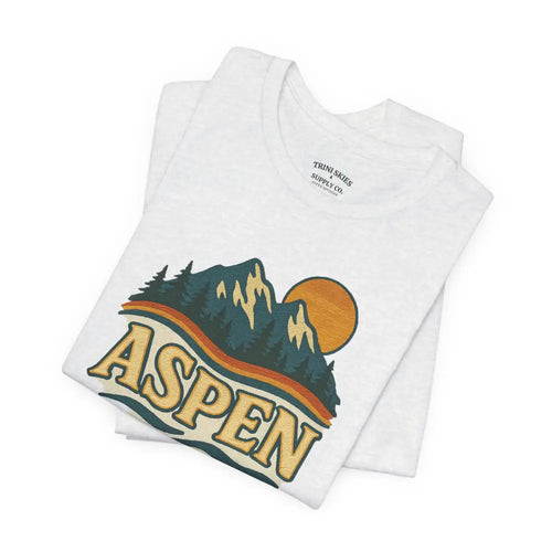 White Aspen Lodge Tee with colorful mountain and ASPEN graphic by Trini Skies Supply