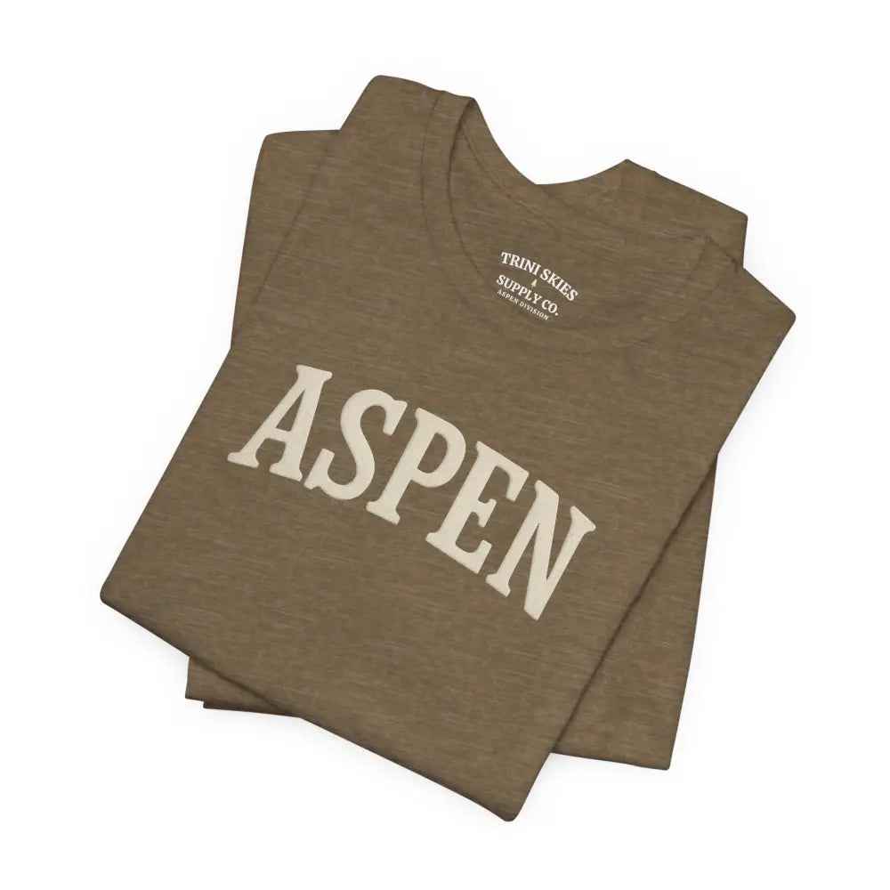 Folded brown Aspen tee with minimalist Aspen chest graphic in detailed DTG collegiate style