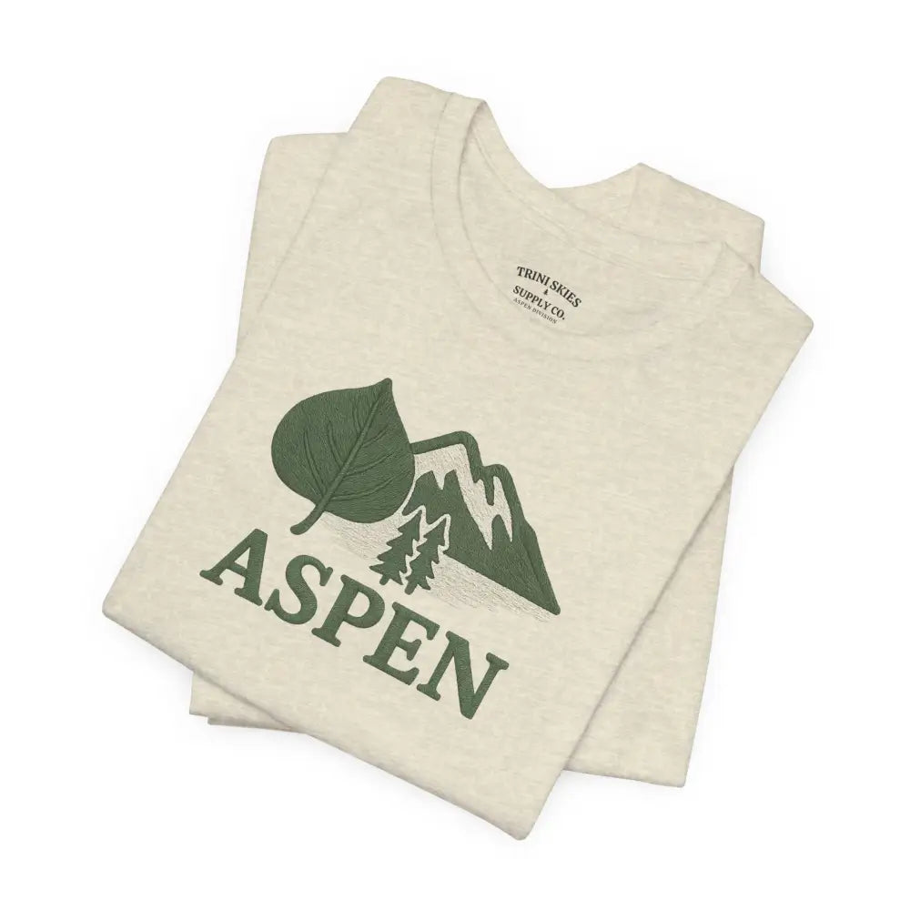Folded cream Aspen Mountain Tee with green Aspen design