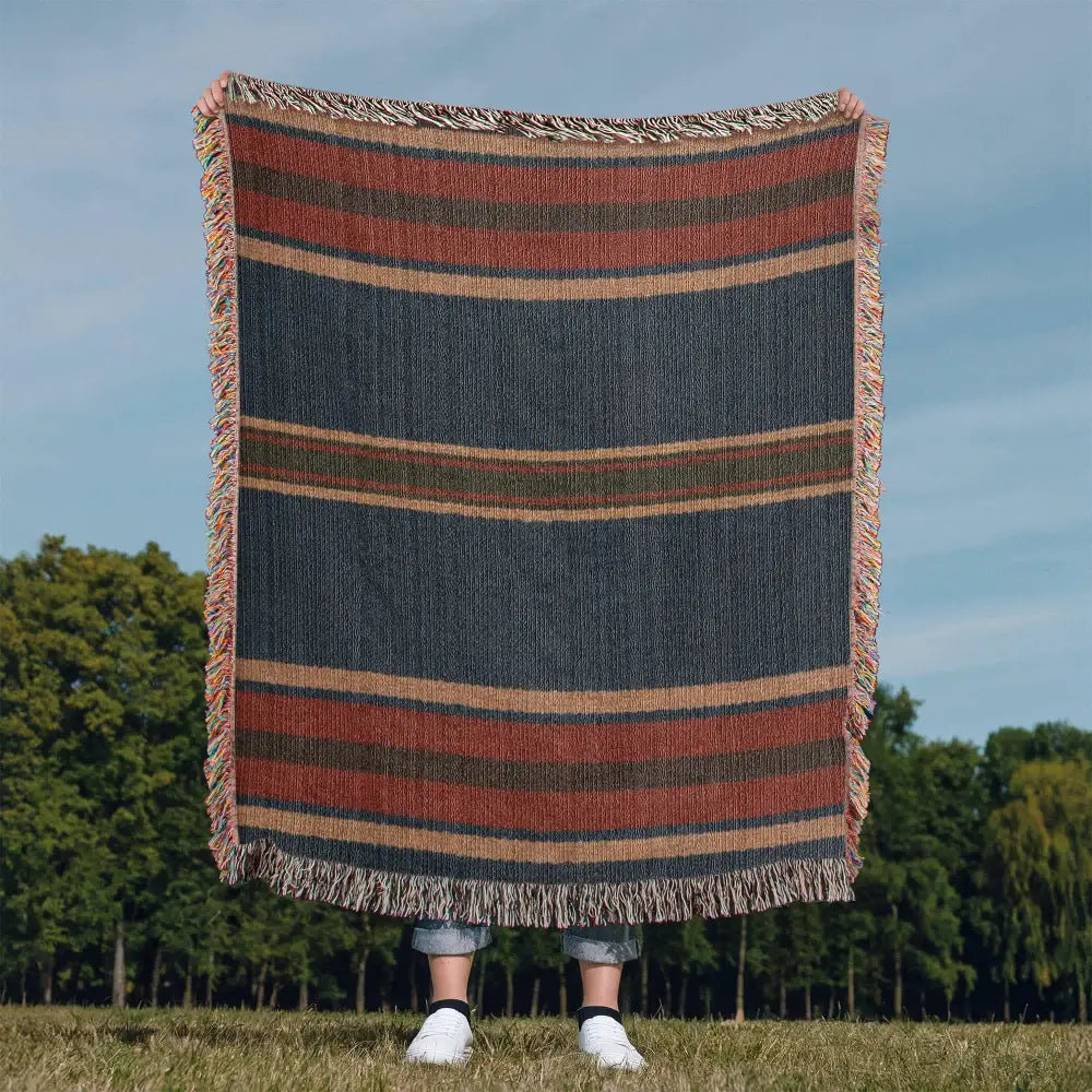 Aspen stripe woven blanket in navy, rust, beige stripes with fringe