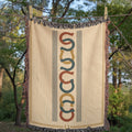 Woven mockup of the Horseshoe Row design showing the repeating horseshoe motif column on an ivory field, before final rendering — Trini Skies