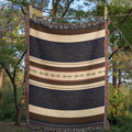 Woven mockup of the Stirrup Row equestrian design showing the navy and cream stripe pattern with horseshoe motif, before final rendering — Trini Skies