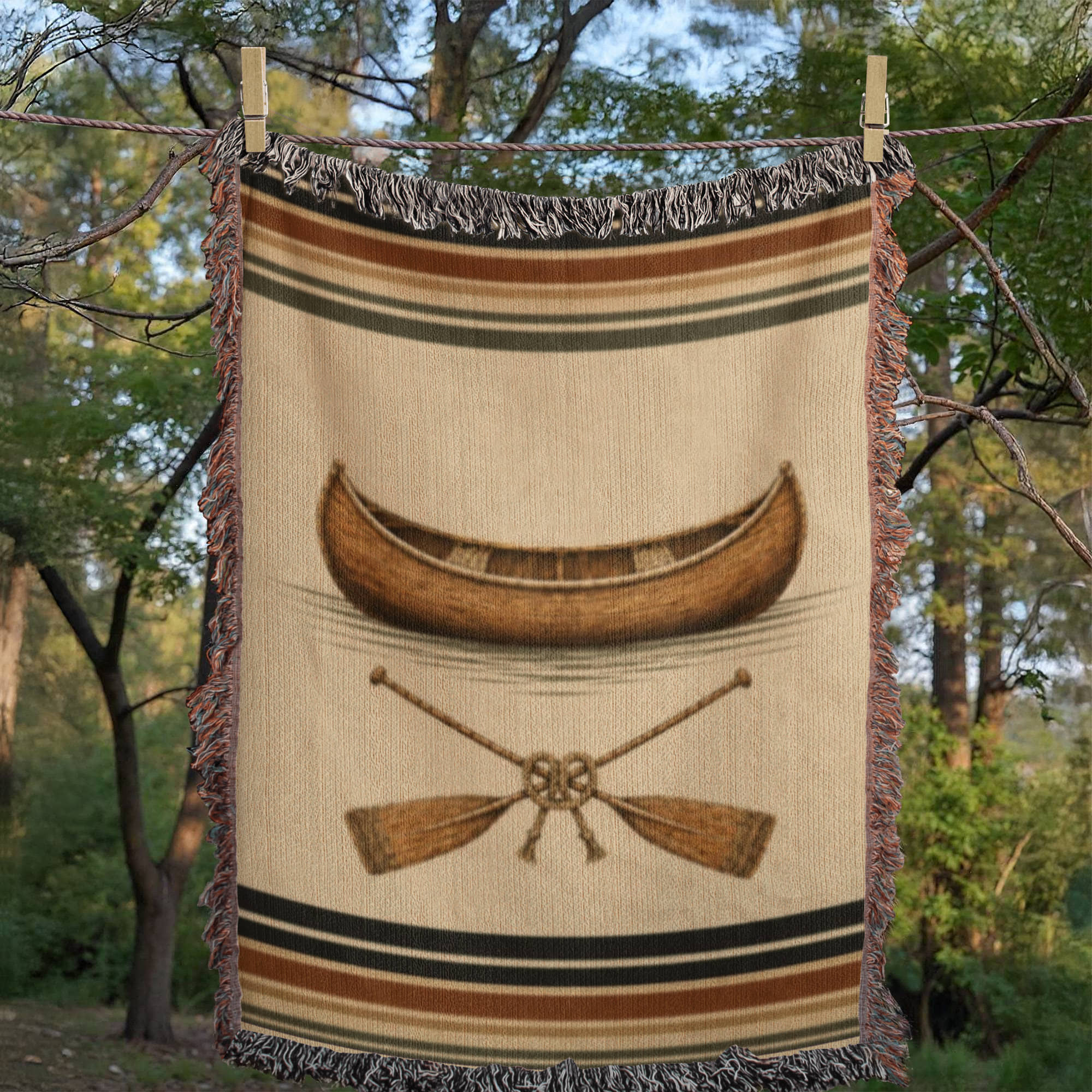 The Portage canoe and crossed paddles woven throw blanket with woven fringe — Trini Skies