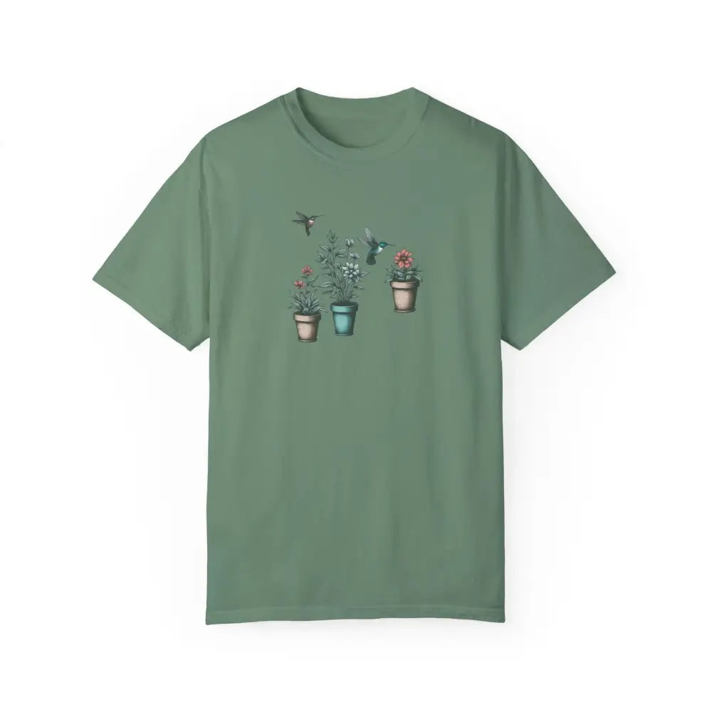 Green Hummingbirds Comfort Tee with potted plants and birds design