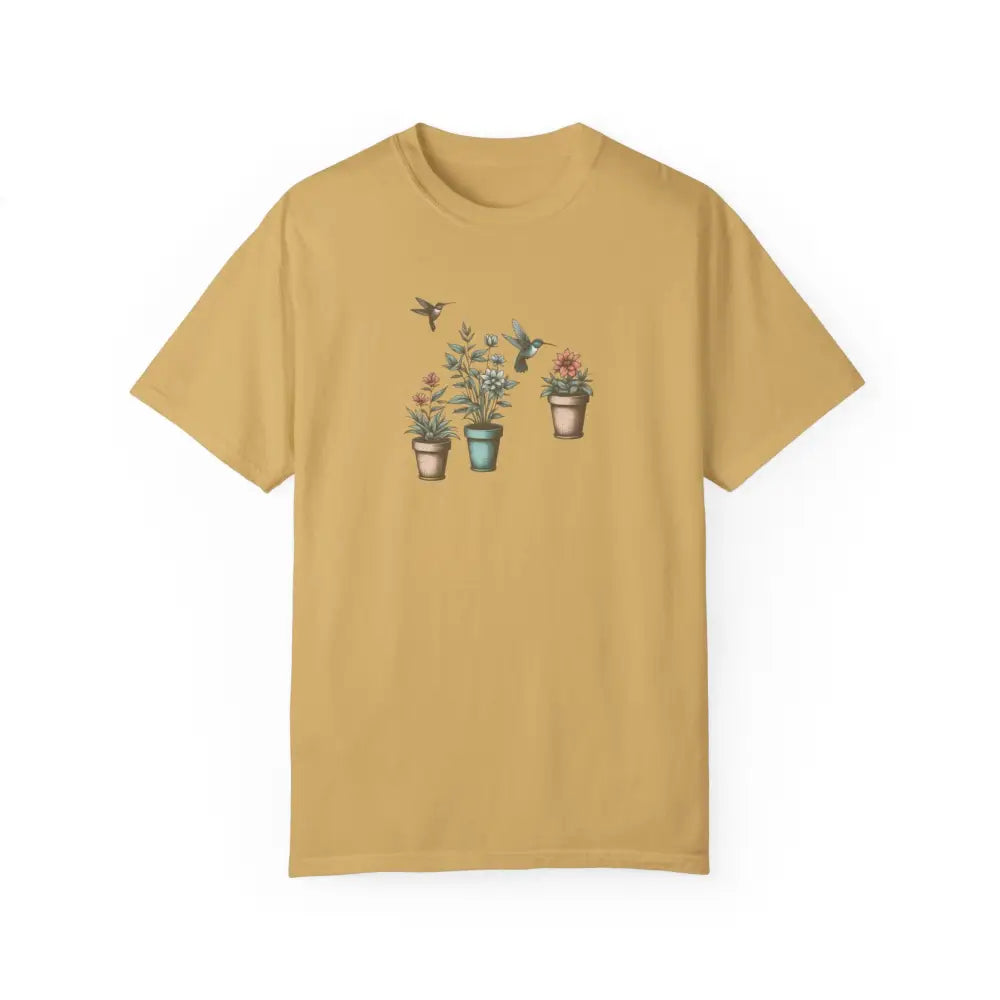 Short-sleeved mustard yellow hummingbirds comfort graphic tee with potted plants