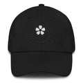 Black floral smiley face dad hat embroidered with white flower design