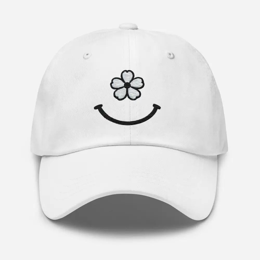 White floral smiley face dad hat embroidered with flower and smile