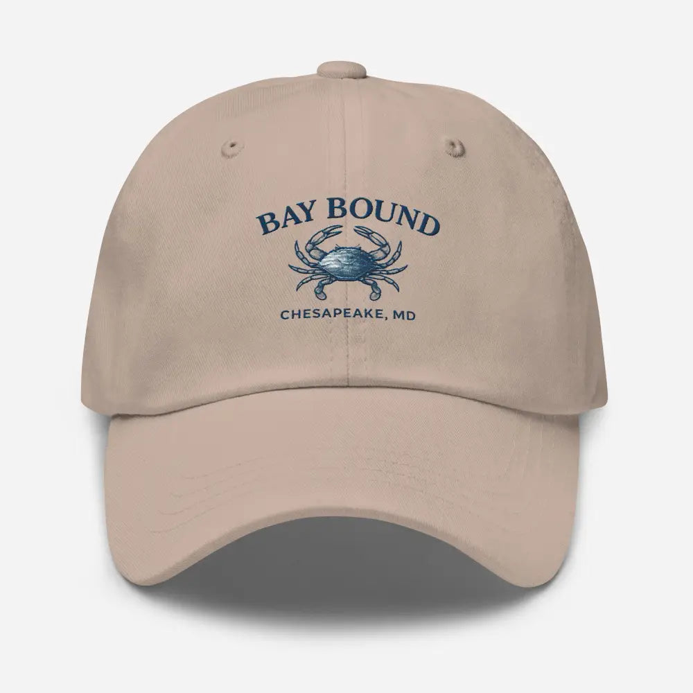 Light brown Yupoong dad hat with blue crab and Bay Bound Chesapeake MD embroidery