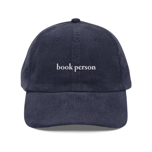Navy blue Trini Skies embroidered vintage corduroy cap with Book Person design