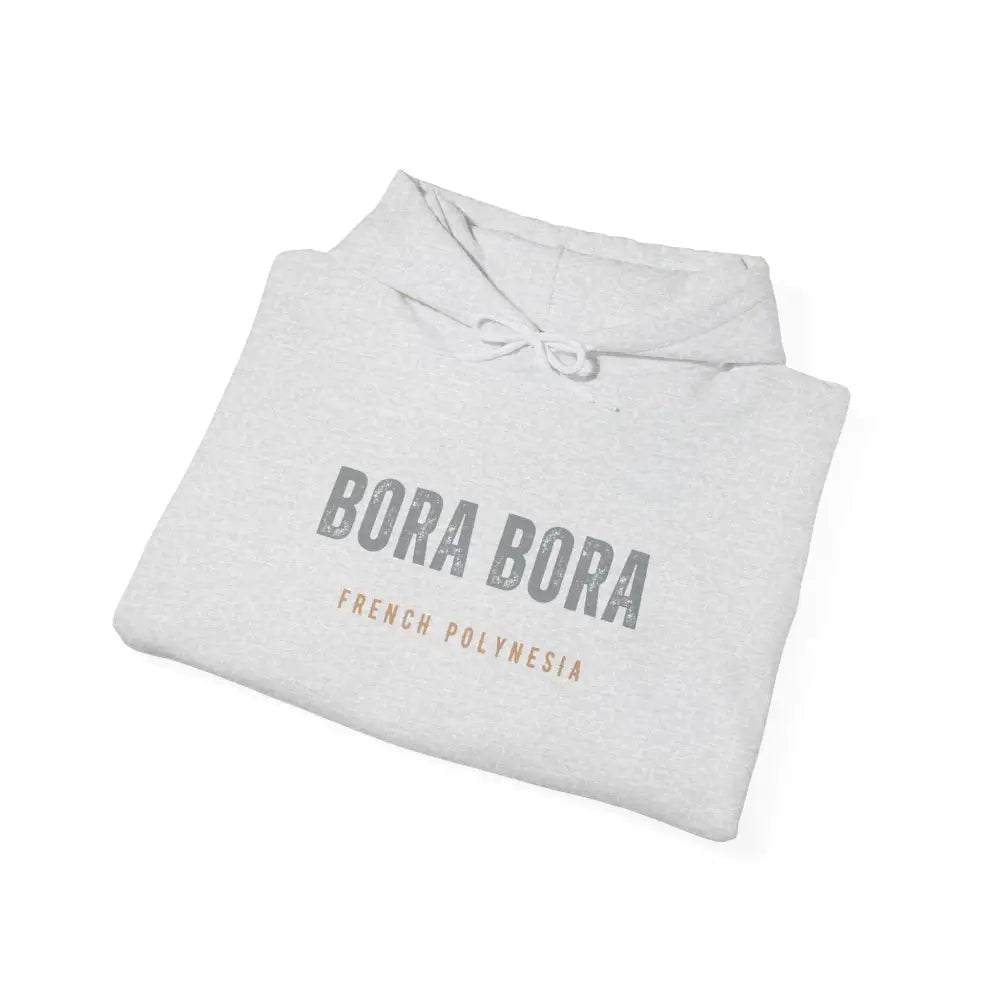 Folded white Bora Bora unisex graphic hoodie with Trini Skies embroidery