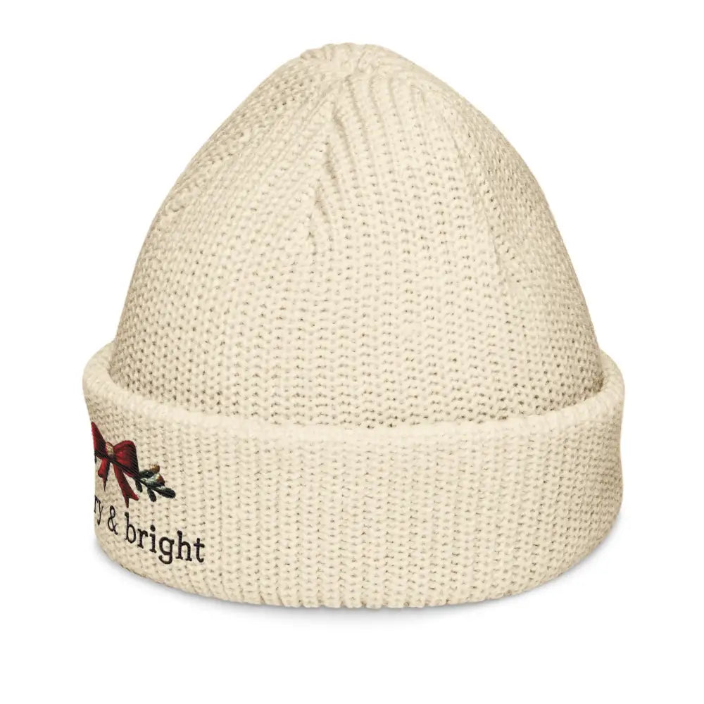 Cream-colored embroidered corduroy cap with bright Christmas bow and foliage