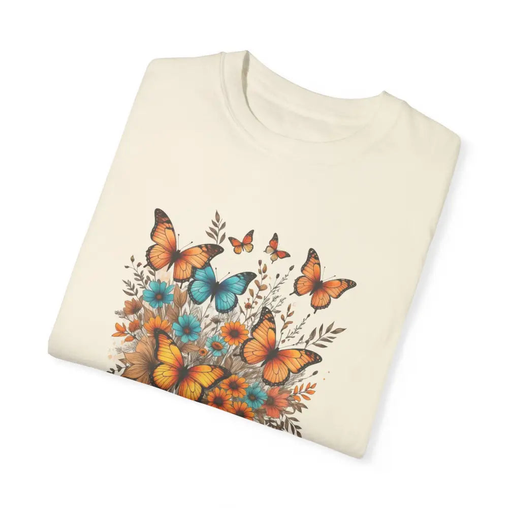 Cream-colored Wings of Tranquility unisex garment-dyed butterfly floral tee