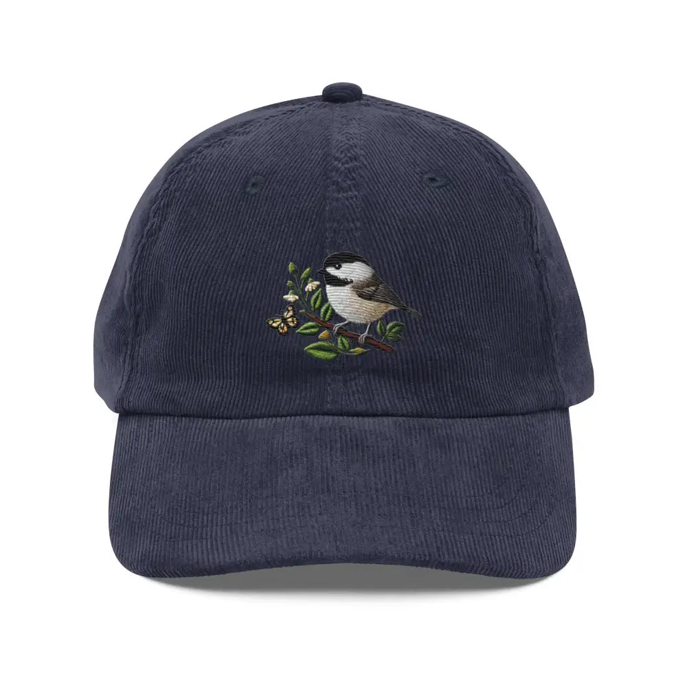 Embroidered chickadee on vintage-style navy corduroy cap with butterfly