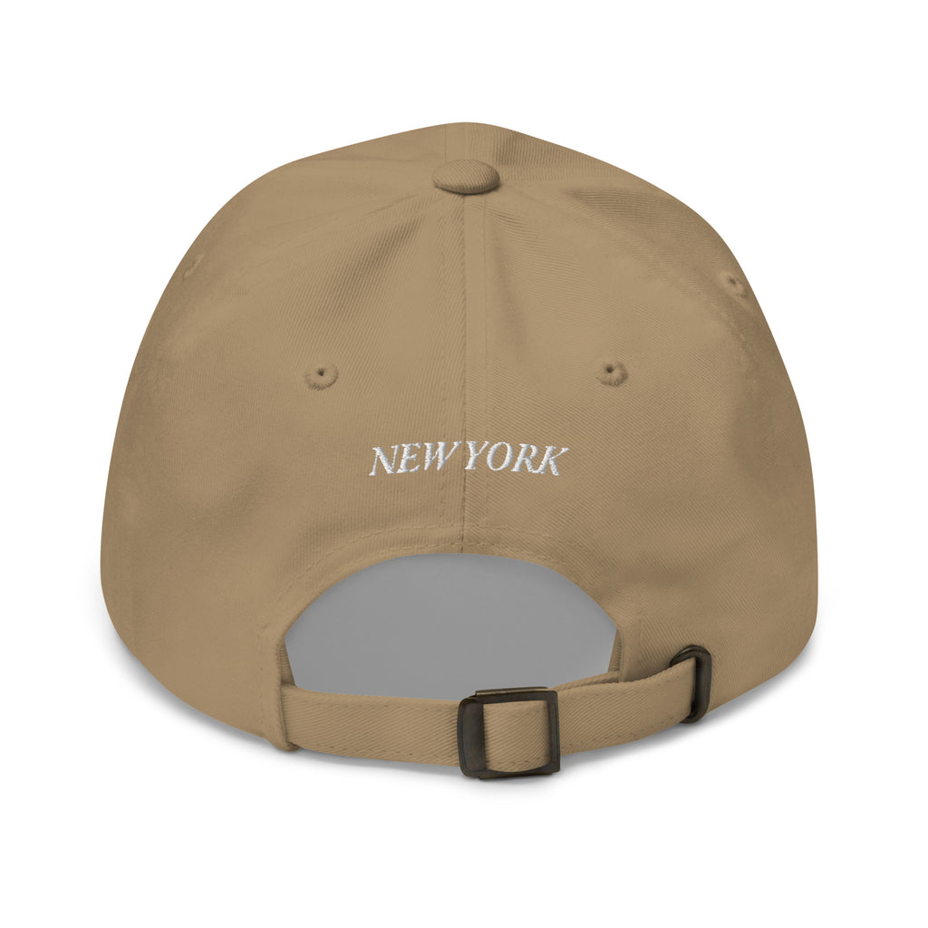 New York Carriage cotton twill dad hat khaki back view New York text strap Trini Skies