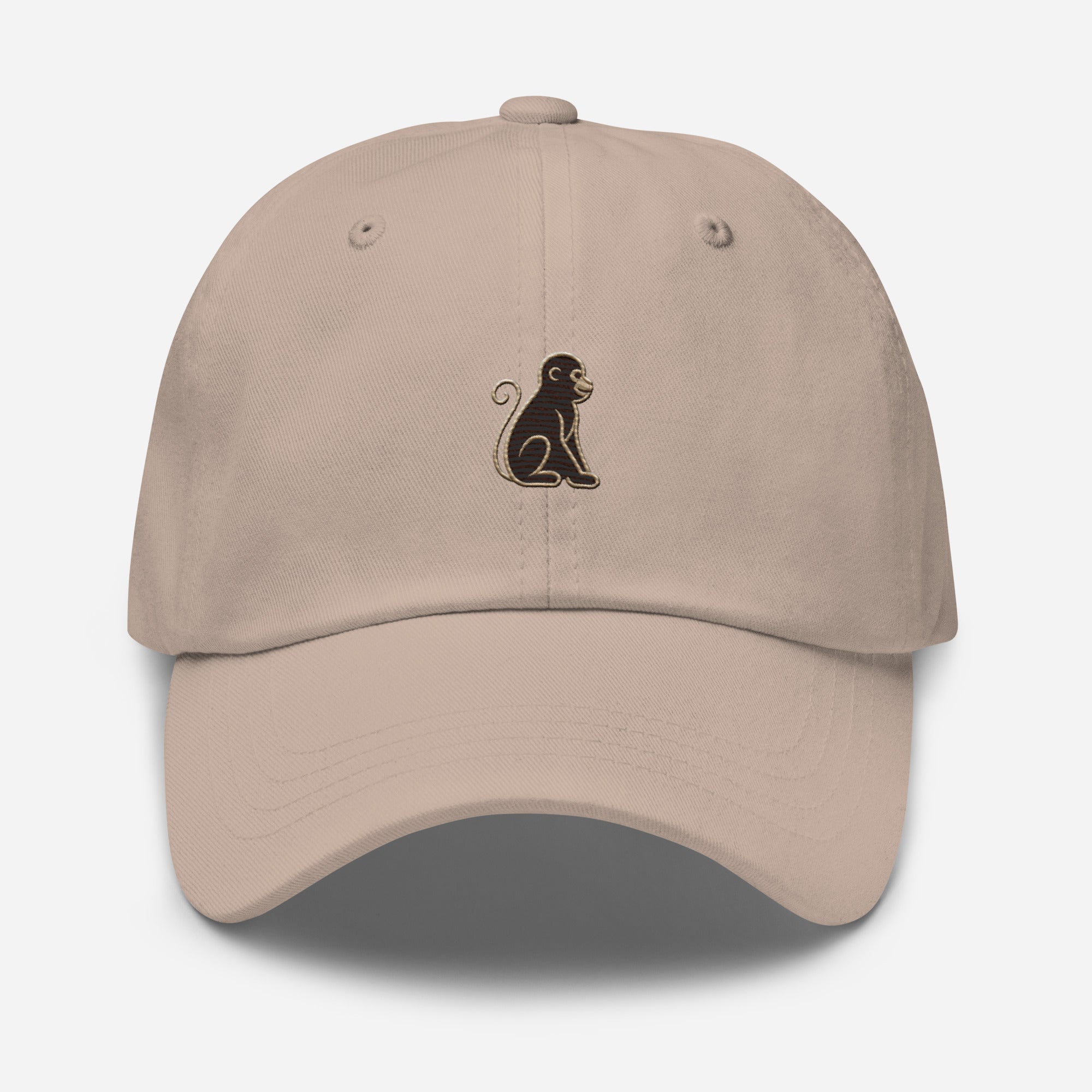 Signature Monkey Embroidered Dad Hat by Trini Skies in stone cotton twill, front view showing monkey emblem centered on panel, curved brim