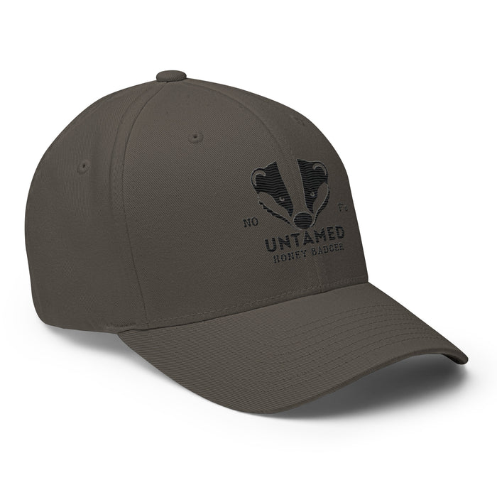 Untamed Badger Embroidered Structured Twill Cap. Stretch Fit Athletic Hat