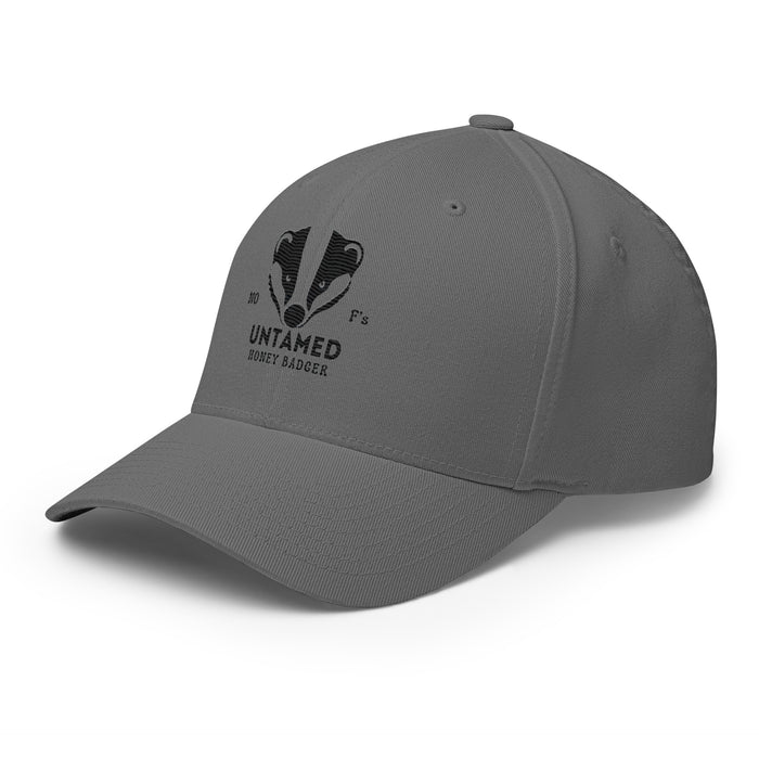 Untamed Badger Embroidered Structured Twill Cap. Stretch Fit Athletic Hat