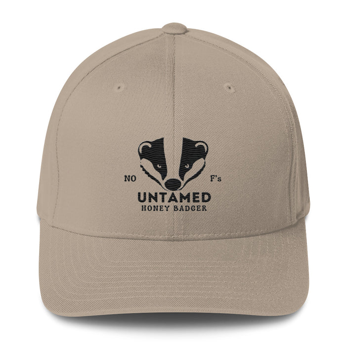 Untamed Badger Embroidered Structured Twill Cap. Stretch Fit Athletic Hat