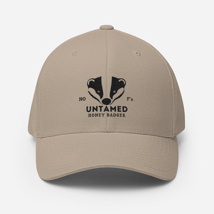 Untamed Badger Embroidered Structured Twill Cap. Stretch Fit Athletic Hat