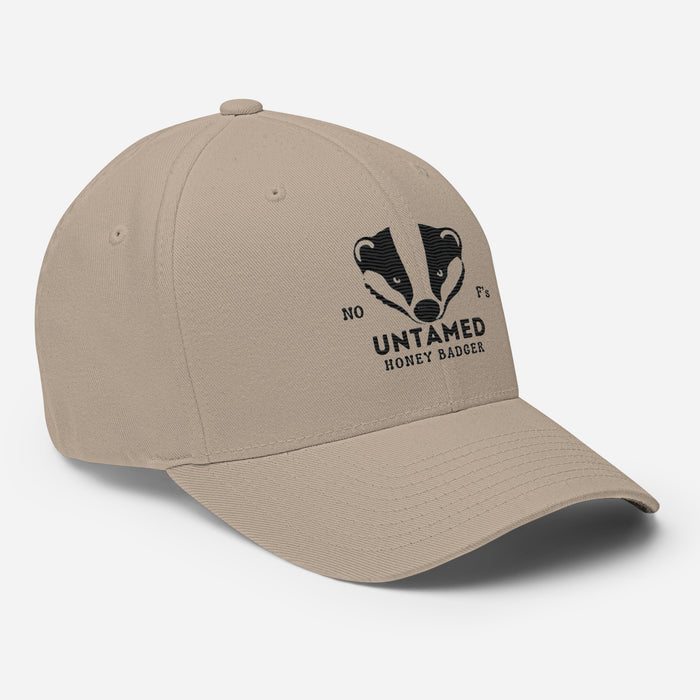 Untamed Badger Embroidered Structured Twill Cap. Stretch Fit Athletic Hat