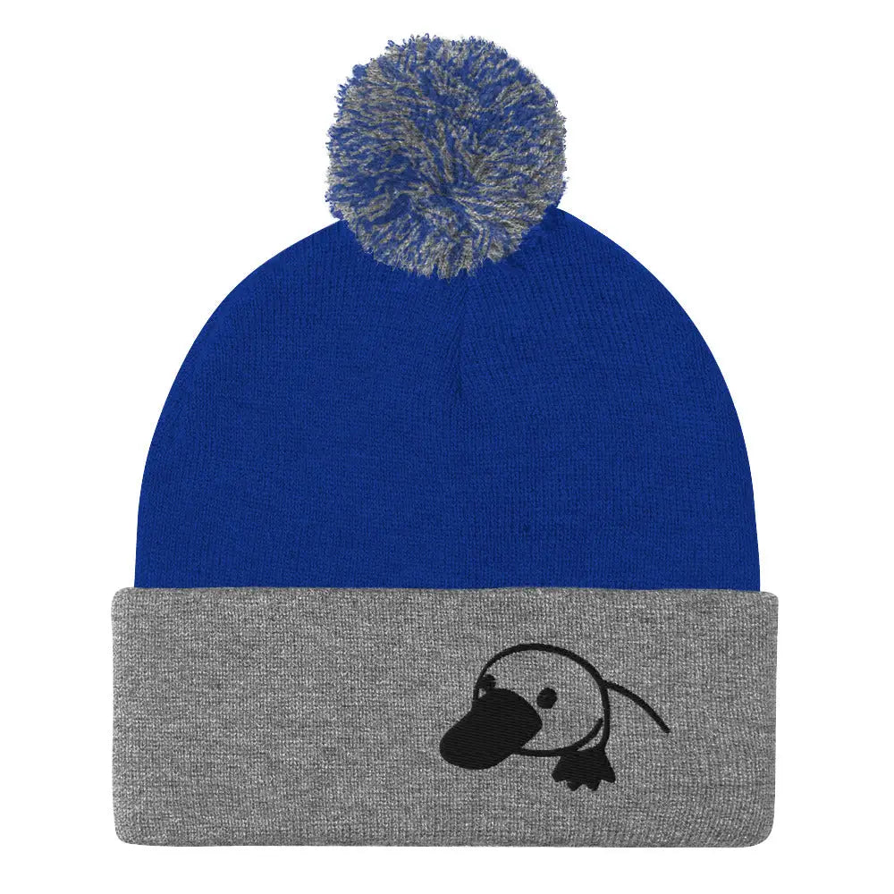 Cozy embroidered platypus pom-pom beanie in blue and grey knit