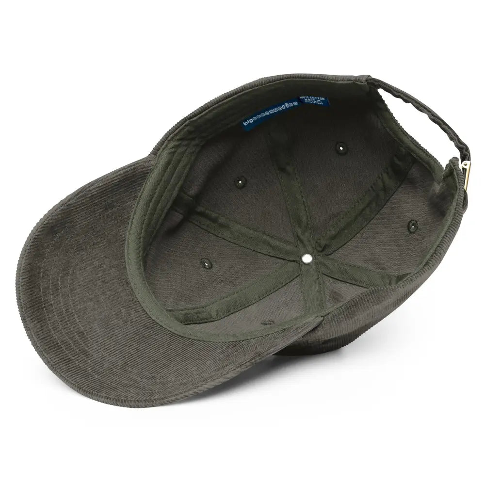 Dark green corduroy Trini Skies cap with cream pugs embroidery