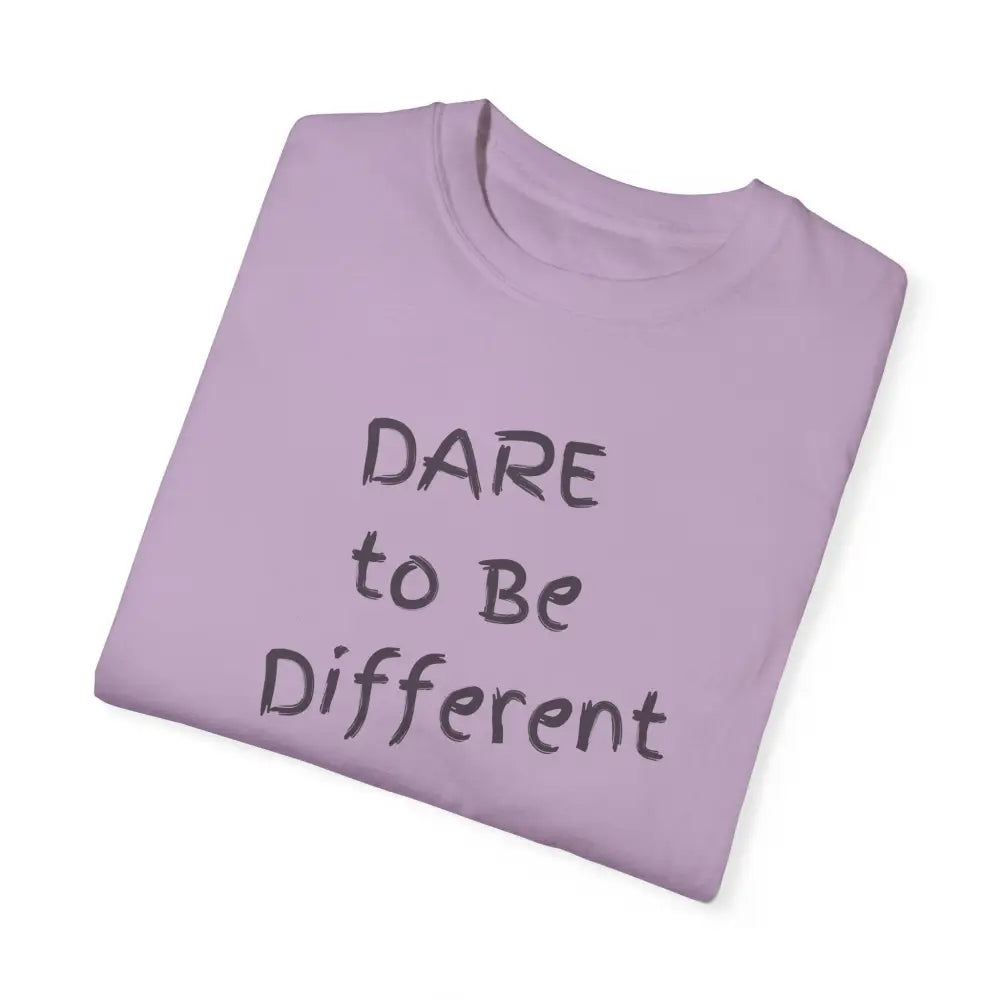 Folded lavender garment-dyed t-shirt Dare to be Different graphic tee