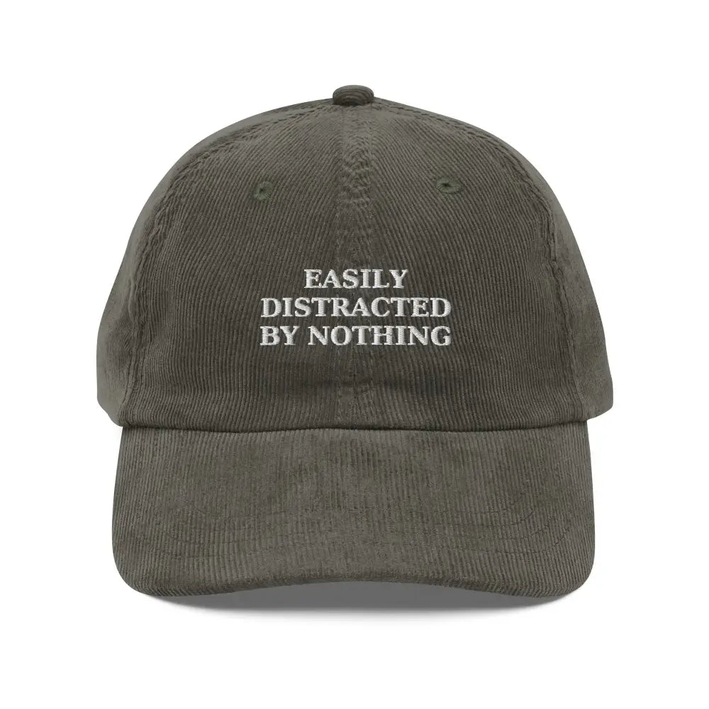 Olive green embroidered vintage corduroy hat with Easily Distracted by Nothing text