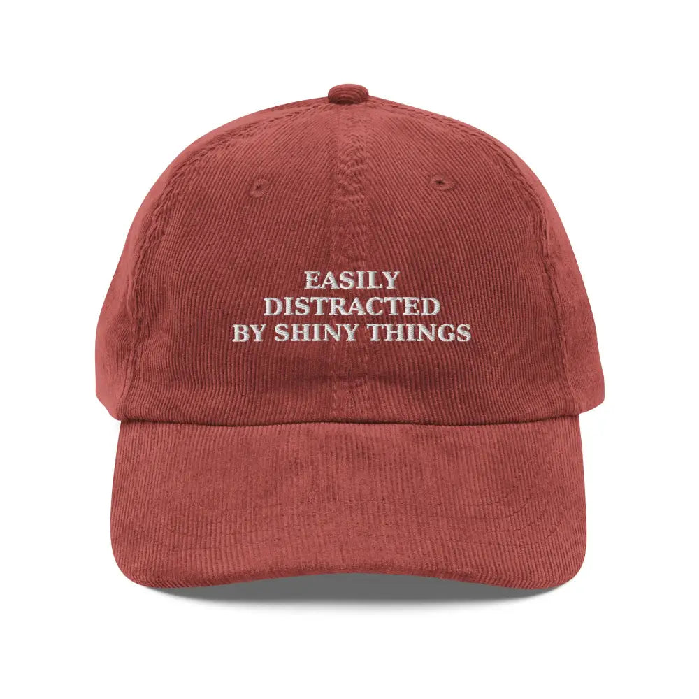 Rust-colored embroidered corduroy cap from Trini Skies