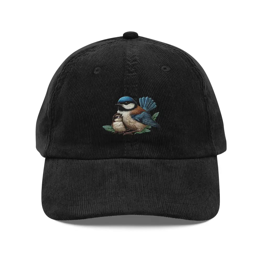 Black vintage corduroy cap with embroidered bird and adjustable gold buckle