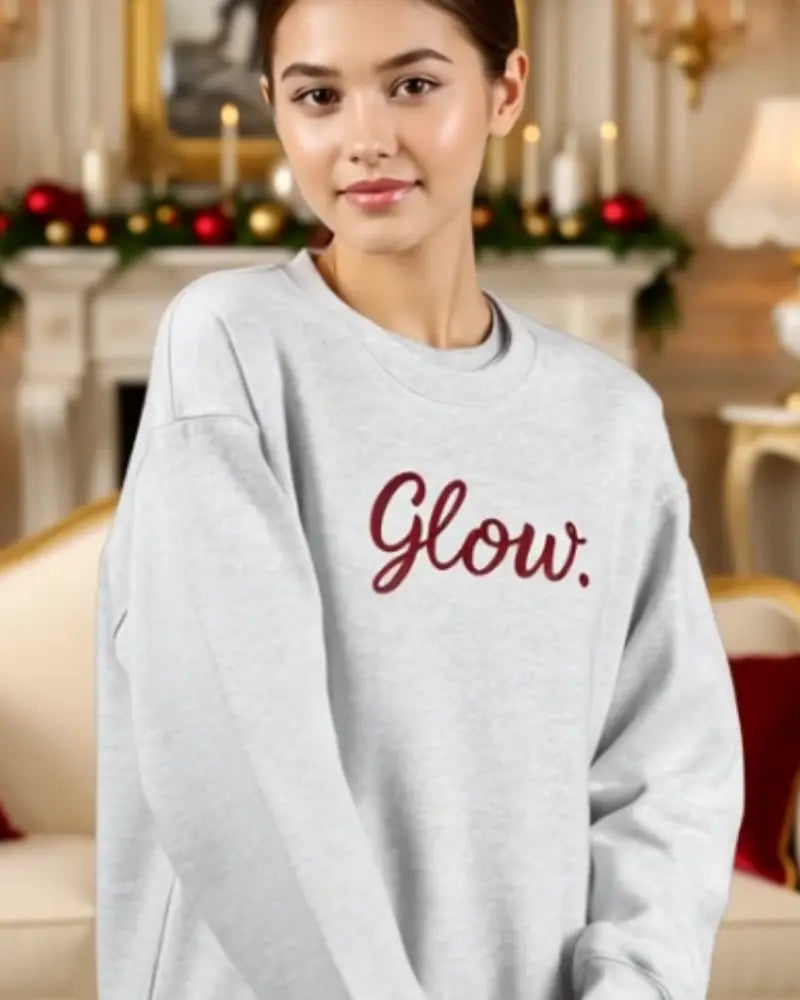 Glow embroidered Christmas sweatshirt in light gray with maroon cursive script