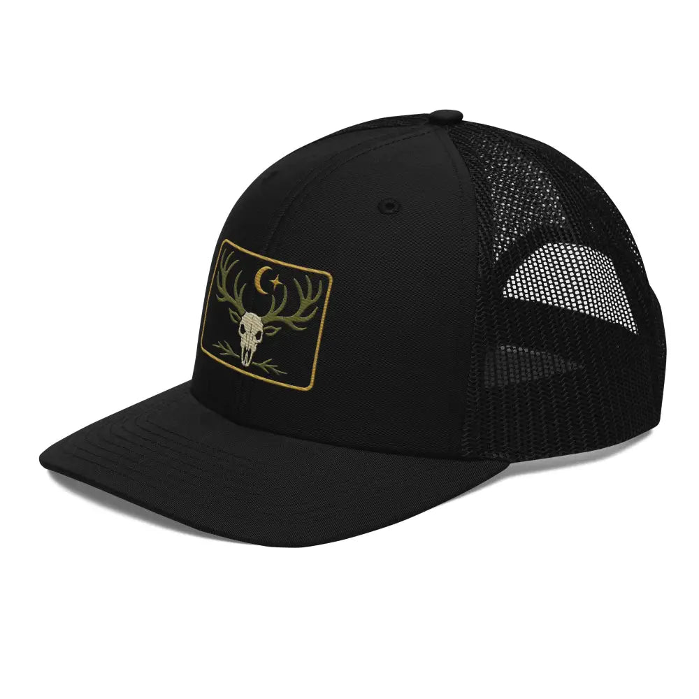 Black embroidered heritage skull trucker hat with deer patch