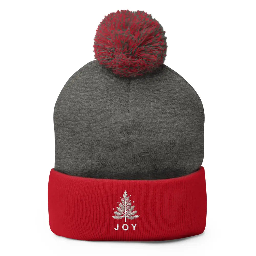 Embroidered Joy Christmas pom-pom beanie in charcoal gray with red cuff