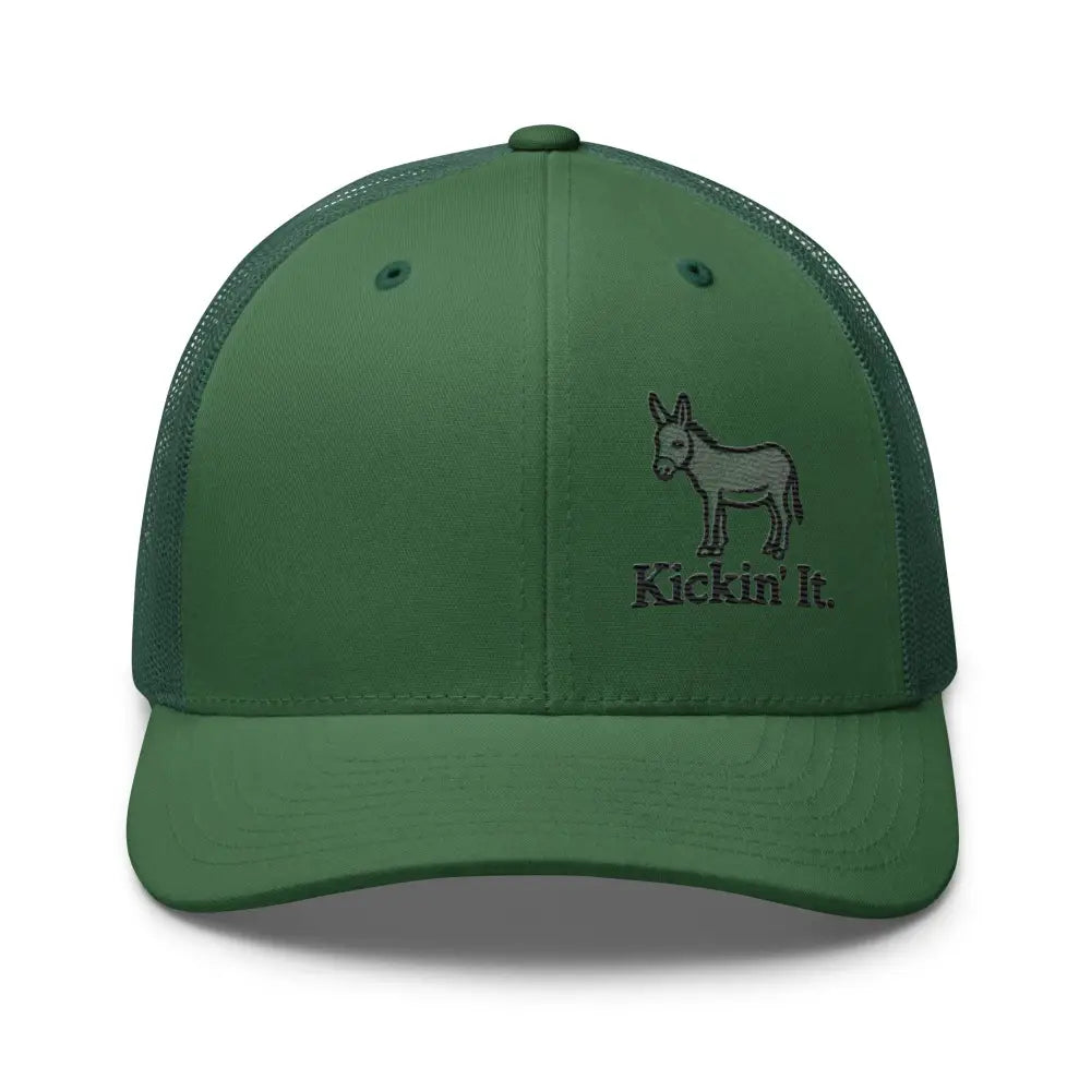 Trini Skies dark green trucker hat with embroidered donkey Kickin It and Make America Great design