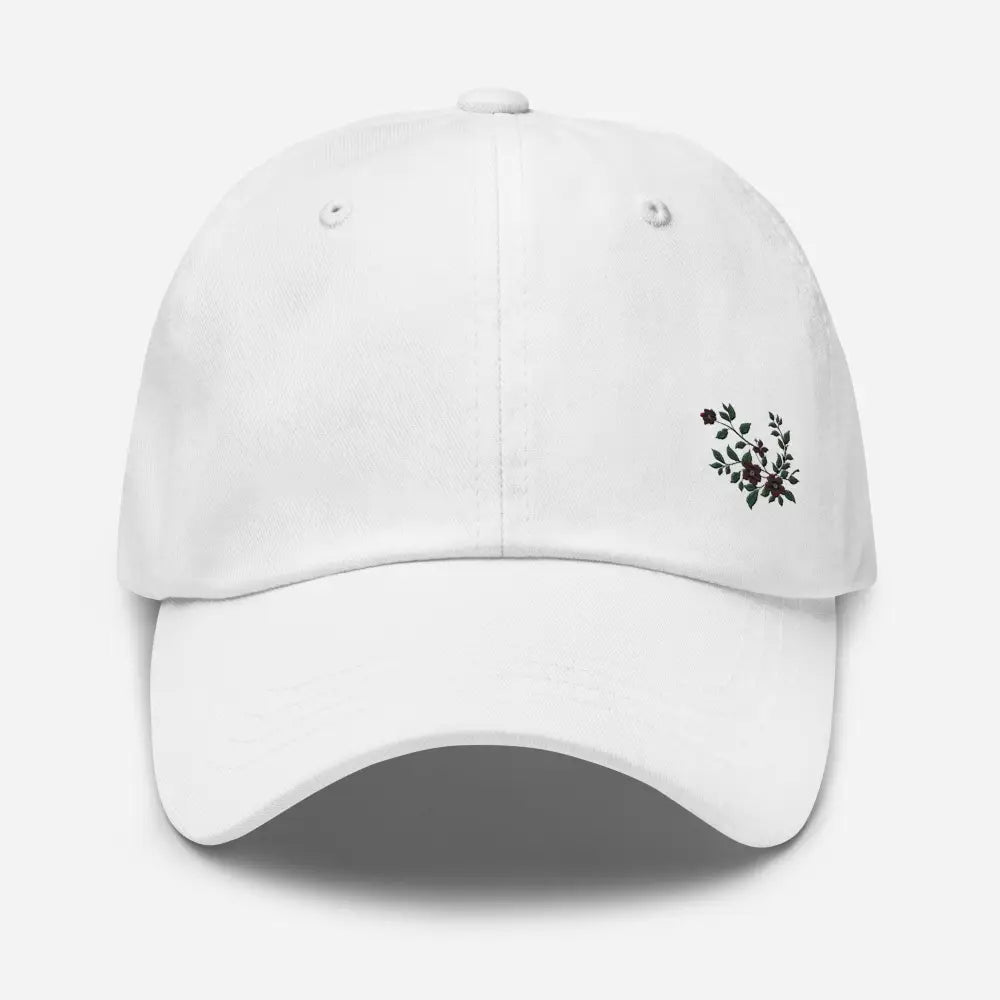 White flower vine embroidered dad hat with black floral design