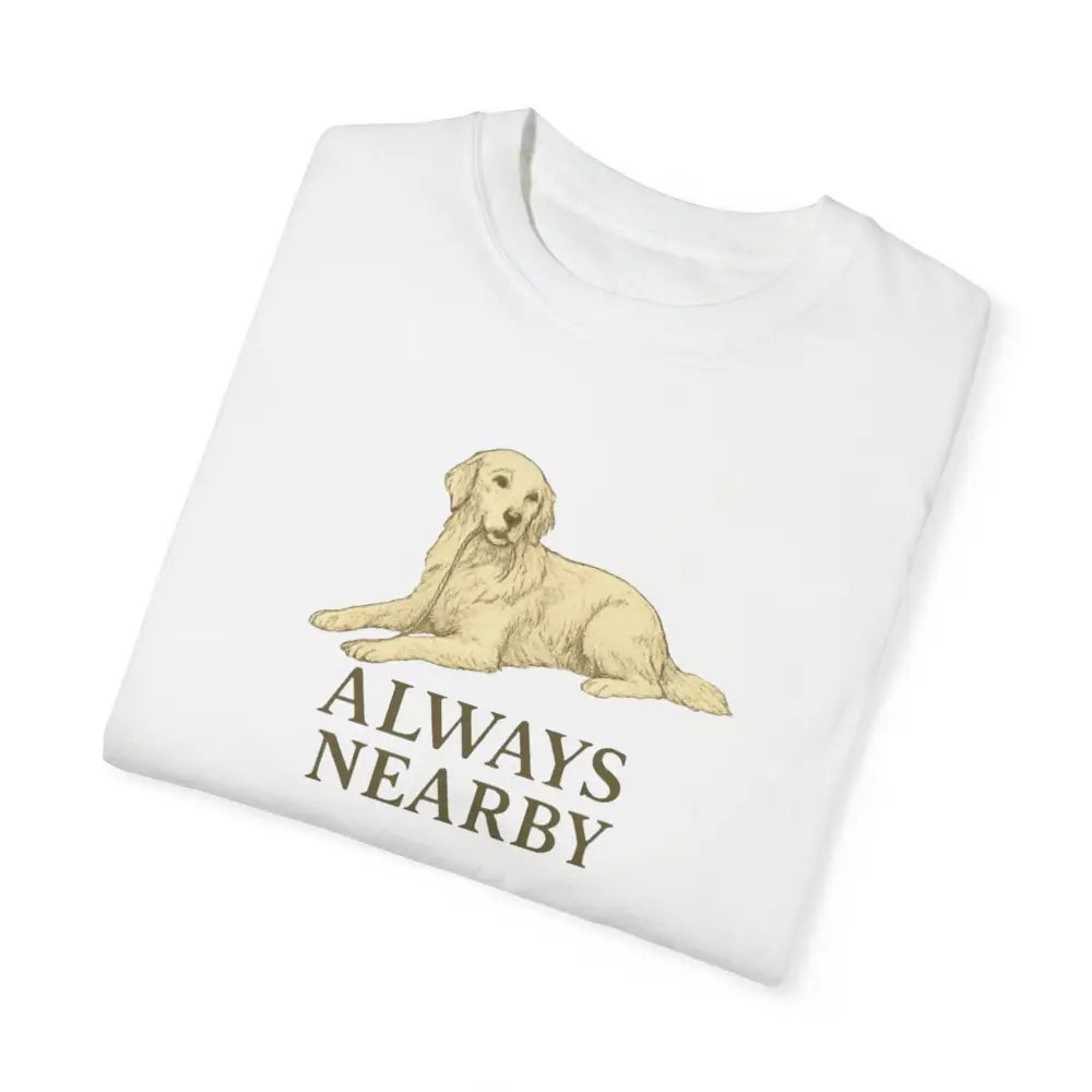 Folded unisex garment-dyed t-shirt with golden retriever graphic from Trini Skies Supply