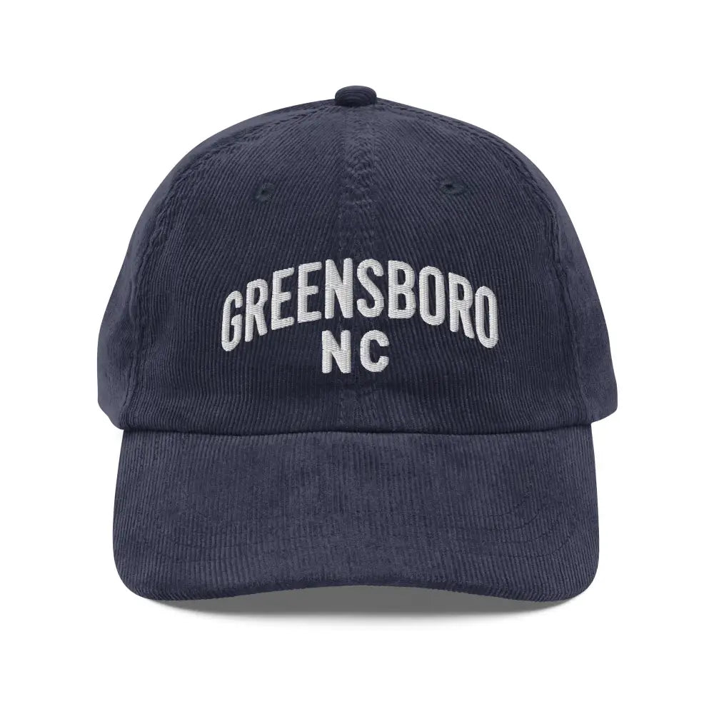 Vintage corduroy cap with Greensboro NC embroidery in white navy blue