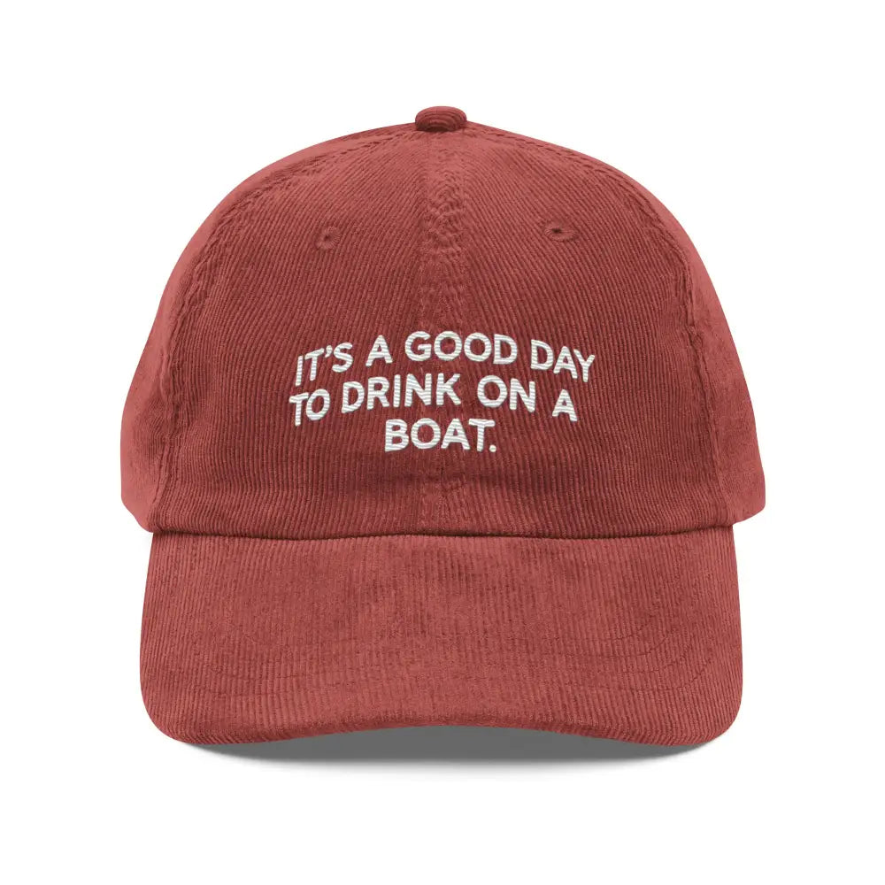 Red embroidered vintage corduroy boat cap with adjustable strap