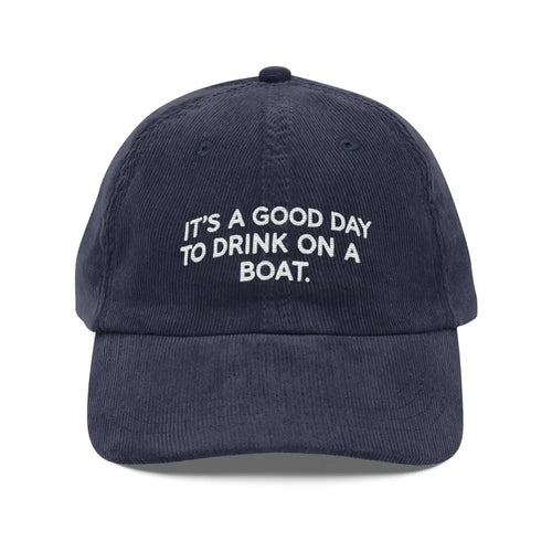 Dark blue embroidered vintage corduroy cap with boat design and adjustable strap