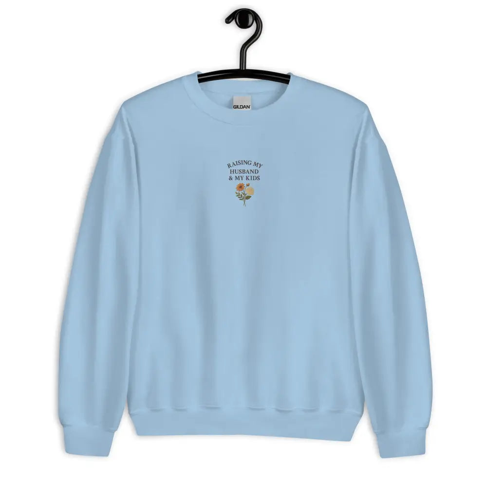 Light blue Trini Skies sweatshirt with floral embroidery for moms