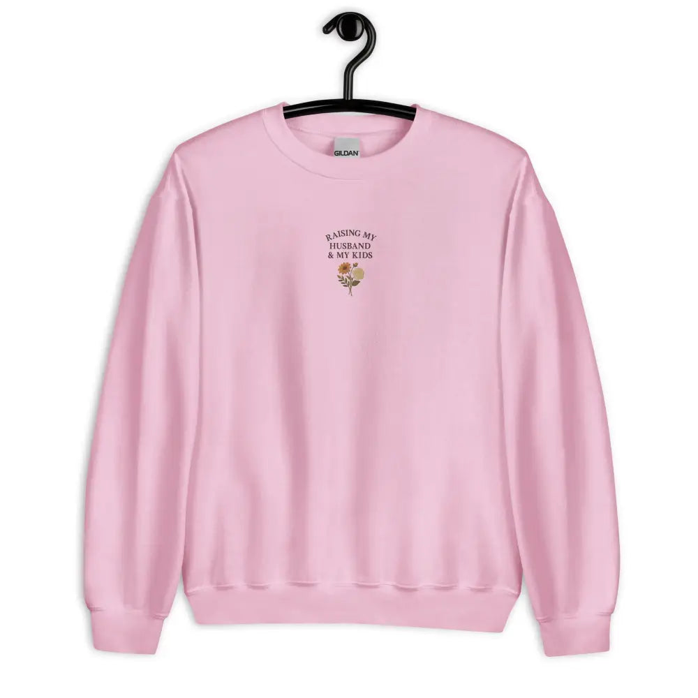 Light pink crewneck sweatshirt with floral design for moms on Mother’s Day