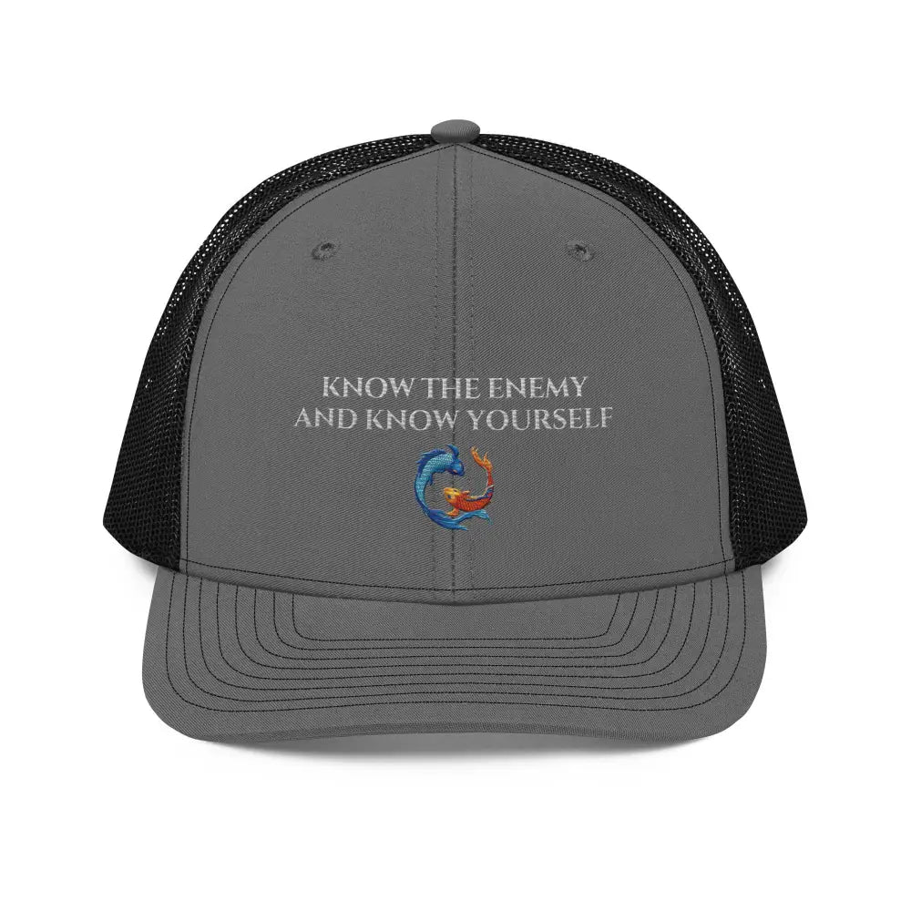 Trini Skies koi fish hat with bold embroidery on trucker cap