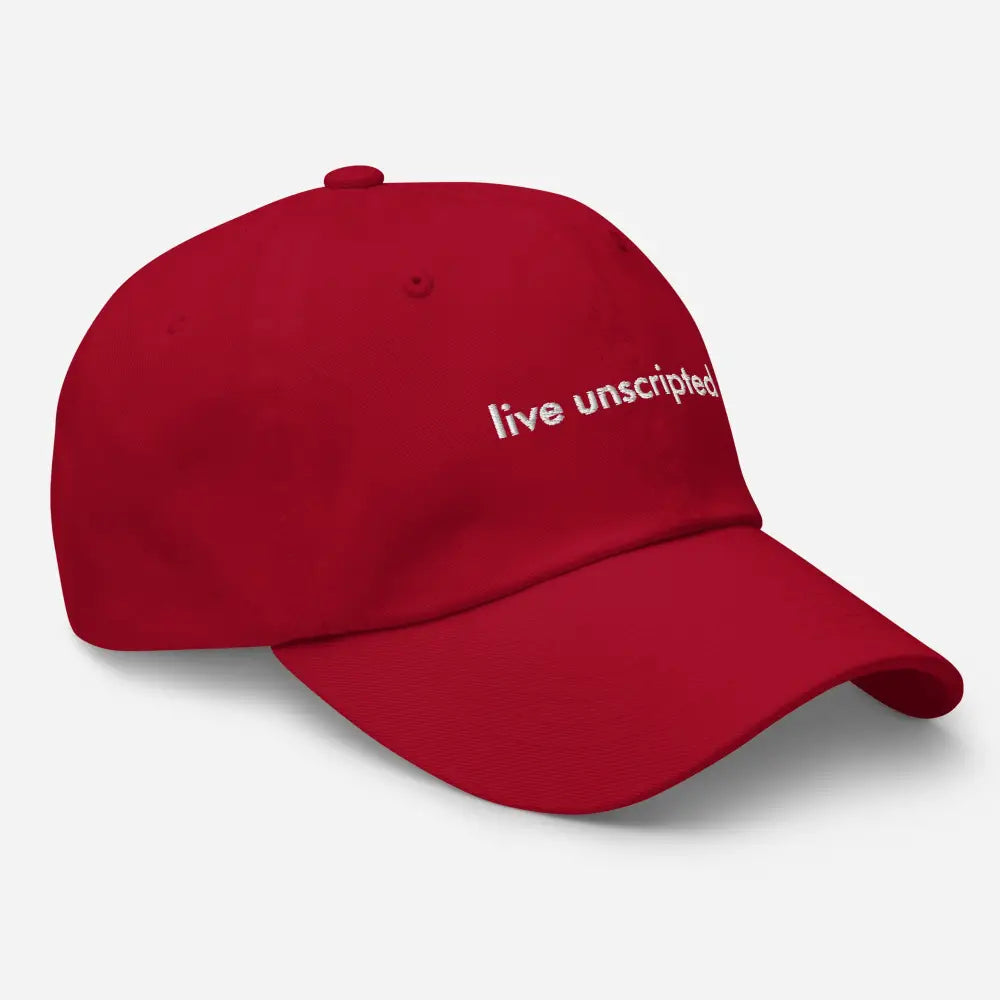 Trini Skies unscripted dad hat in red with live unscripted embroidery