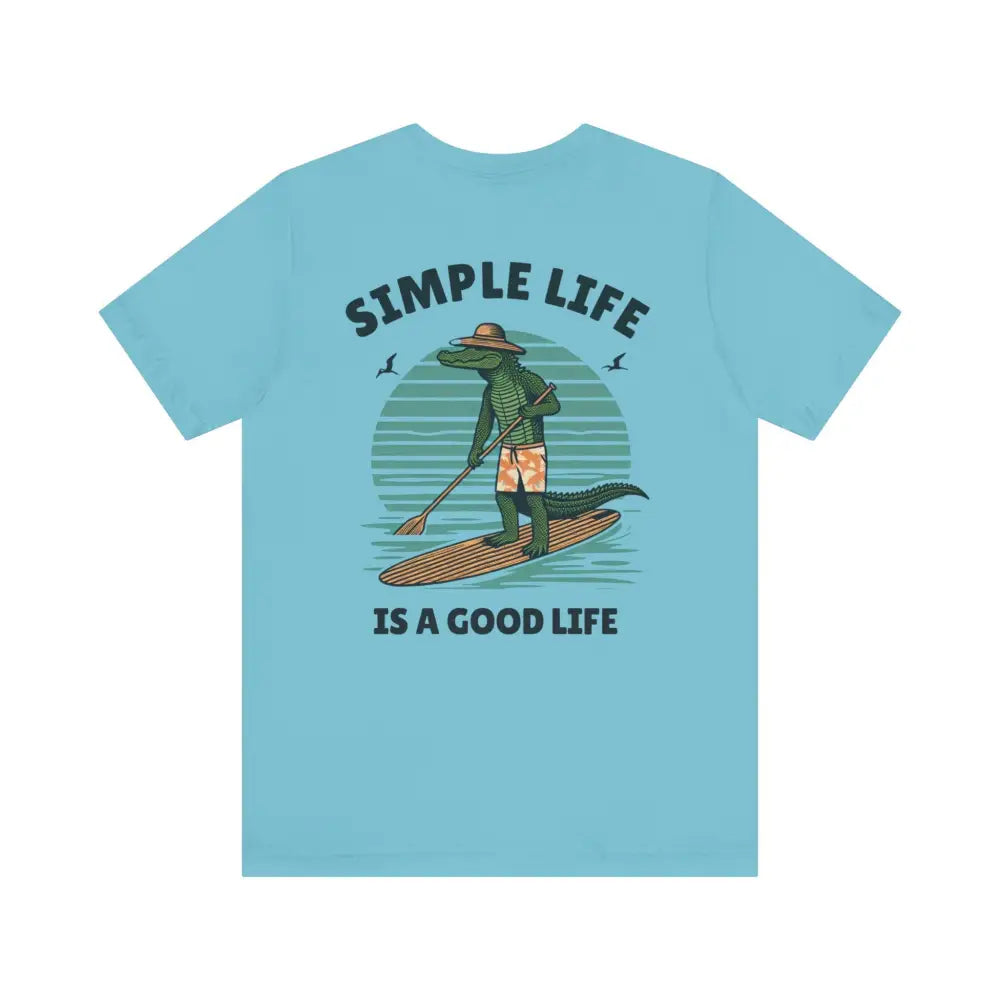 Best Life Alligator graphic tee: light blue paddleboarding alligator
