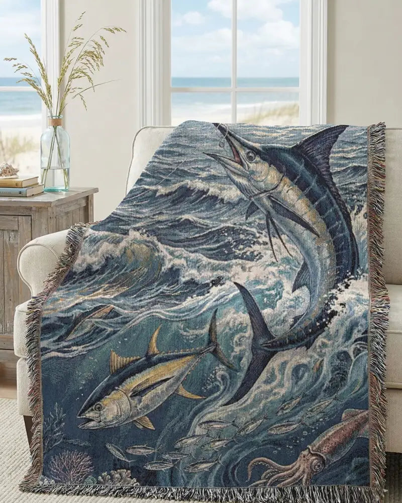 Navy blue woven cotton blanket with marlin tuna ocean wildlife scene