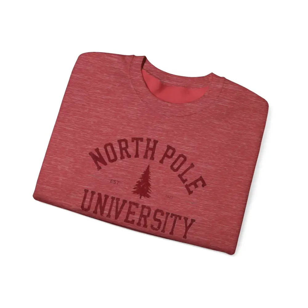 Folded red marl t-shirt with North Pole University graphic varsity Christmas design