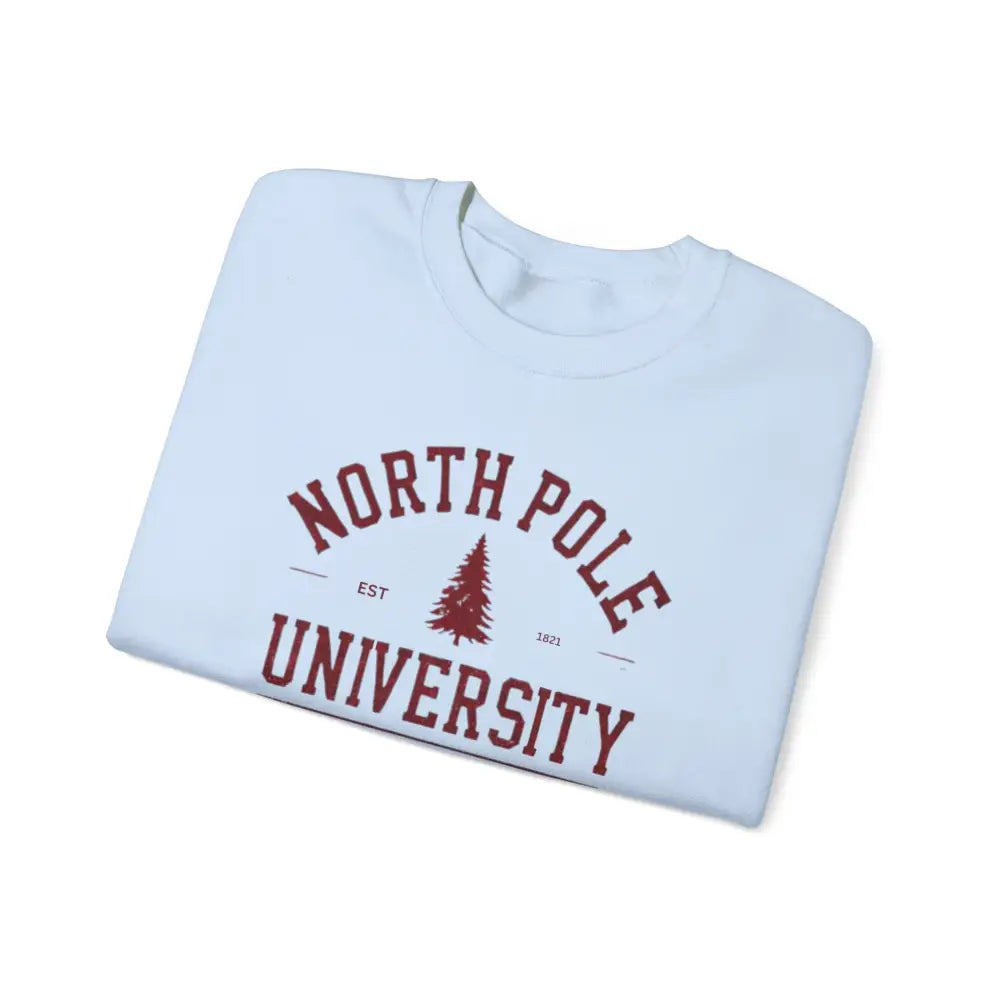 Folded white T-shirt with North Pole University graphic