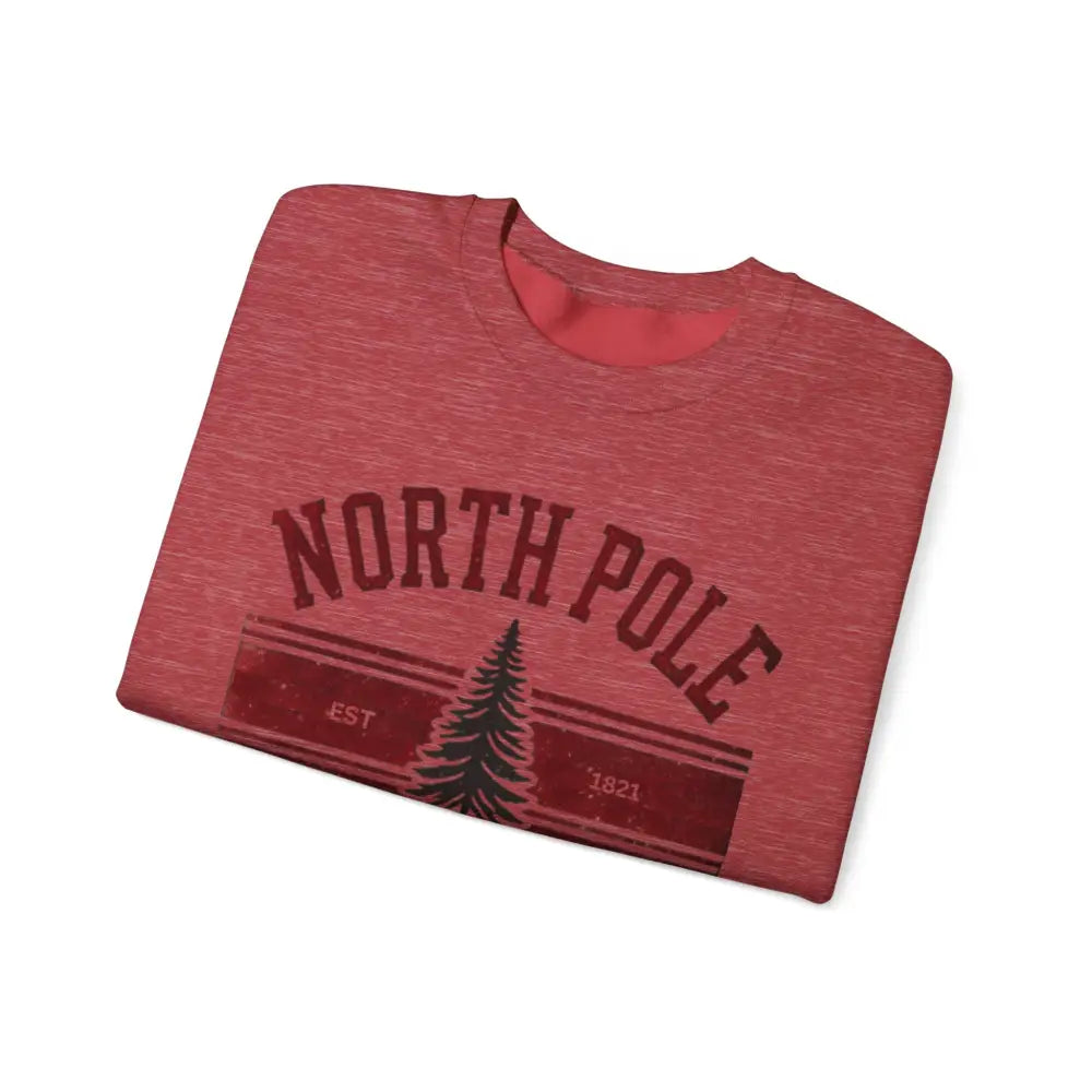 Folded red heathered North Pole University graphic varsity Christmas sweatshirt